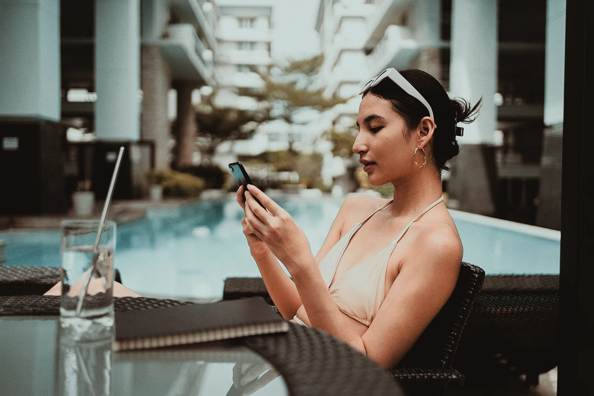 Luxury hotel pool guest digital experience phone