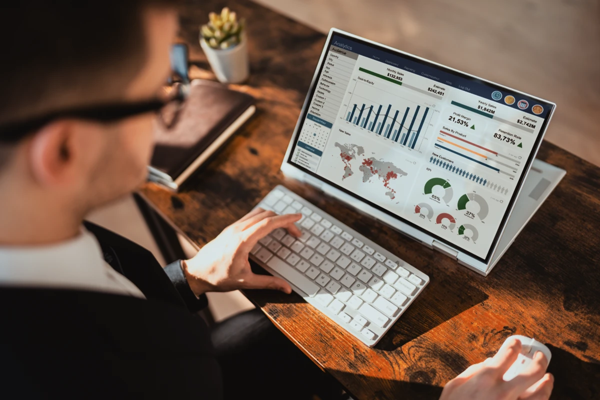 Travel business analytics dashboard laptop screen