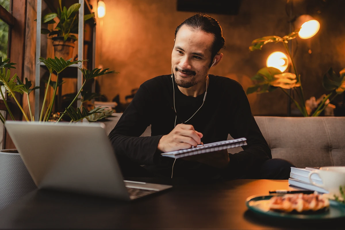 Travel planner laptop work marketing strategy