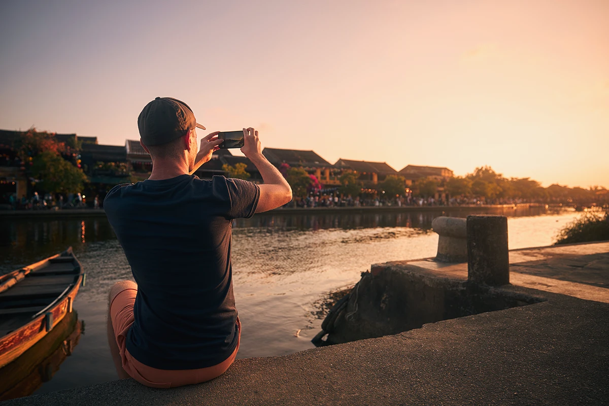 Travel photography smartphone sunset river tourist