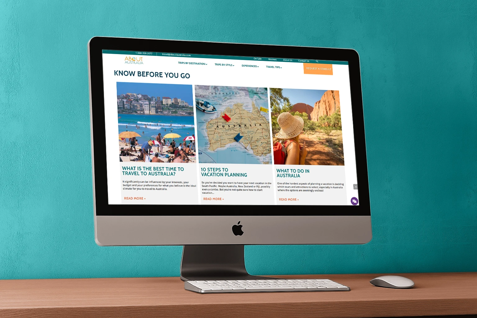 About Australia travel website displayed on iMac desktop showing Know Before You Go blog articles with Australian destinations