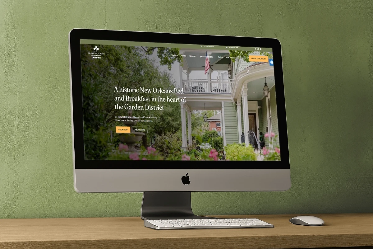 Grand Victorian Bed and Breakfast website homepage showing historic New Orleans Garden District property