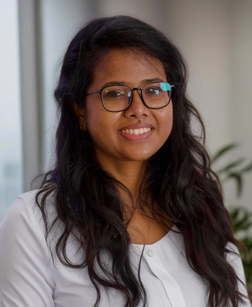 Tour guests looking out from an open-top Hollywood Bus Tour at a beautiful Beverly Hills mansion during a celebrity homes tour in Los Angeles